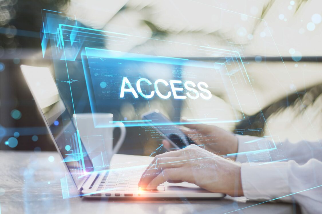 Nonprofit web access: A laptop showing the 3D version of a page with the word "ACCESS"
